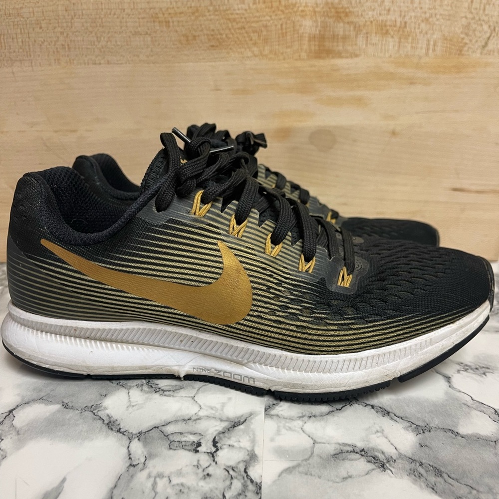 Nike air zoom. Black and Gold. Gently used for errands.